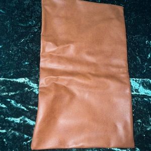 Three green pillowcases 1 long leather and white pillowcases